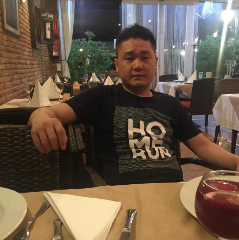 海外游子的第三张照片--漳州婚介网